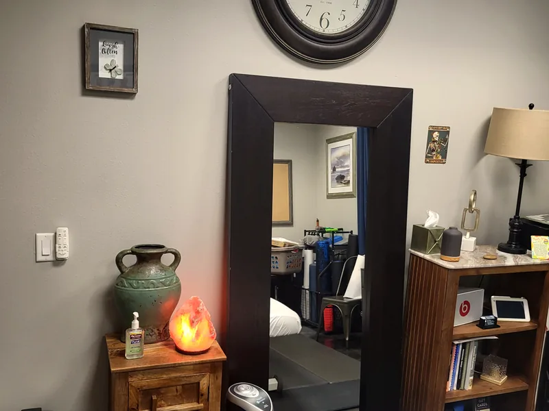 Consultation corner with lamp, salt lamp and shelving at Windows of Wellness, Lake Mary, FL